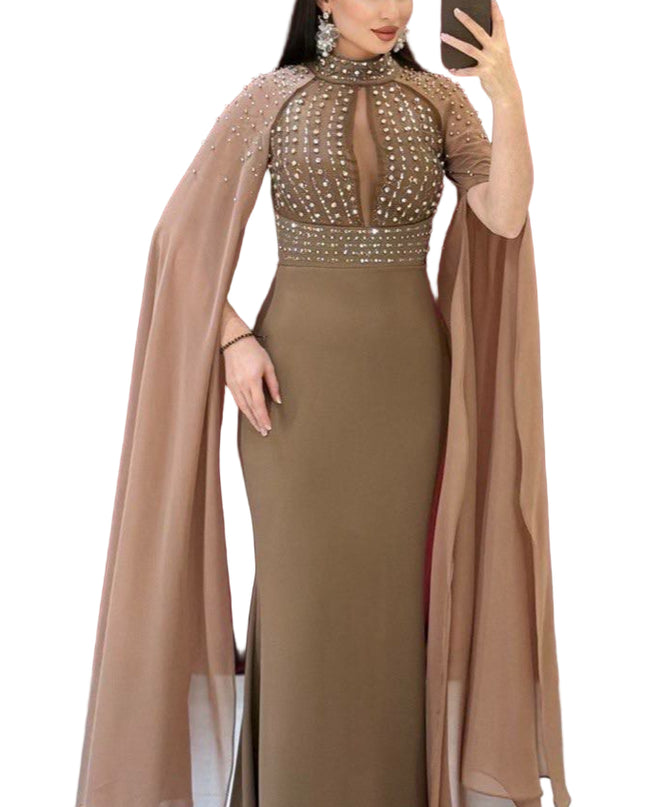 ELEGANT BEADED GOWN WITH FLOWING CAPE DETAIL