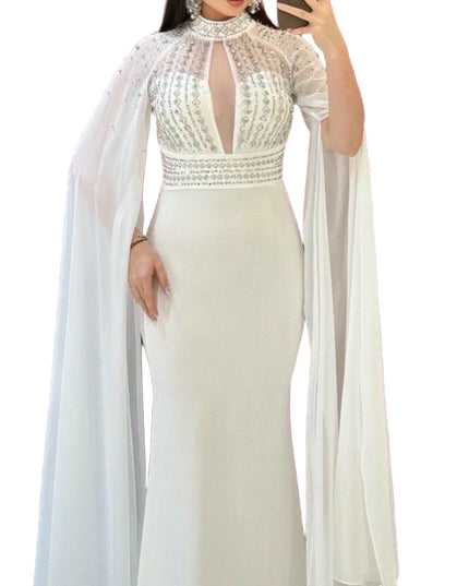 ELEGANT BEADED GOWN WITH FLOWING CAPE DETAIL