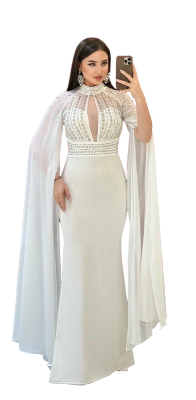 ELEGANT BEADED GOWN WITH FLOWING CAPE DETAIL