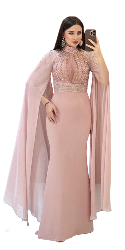 ELEGANT BEADED GOWN WITH FLOWING CAPE DETAIL